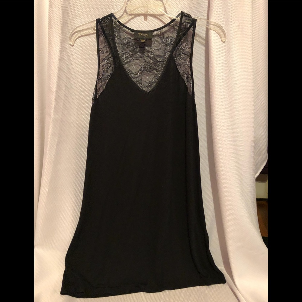 Women’s pajama top trimmed in lace.